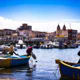Parliamo del pittoresco porticciolo di Santo Spirito, che con i suoi colori e le mille storie � il protagonista indiscusso...